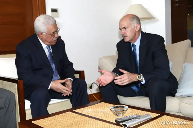 Palestinian President Mahmoud Abbas meets with the Greek Socialist party leader Baba Andrew, in The Greece Capital of Athens.