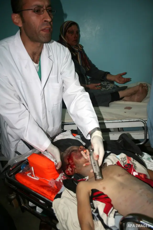 Wounded Palestinians are seen in hospital following an explosion at the home of senior Islamic Jihad leader Ayman Atallah Fayed in the Al-Burij refugee camp in Al-Burij, central Gaza Strip. At least nine people were kill...