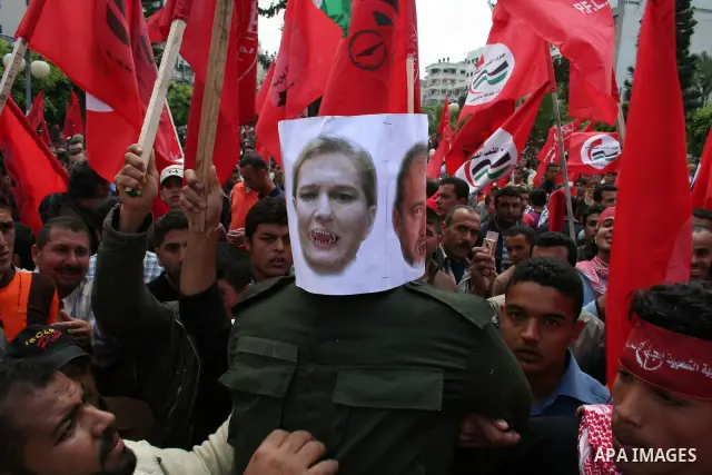 Palestinian workers take part in a protest against the lack of employment opportunities in Gaza City April 30, 2009, a day before World Labour Day APAIMAGES PHOTO / Ashraf Amra