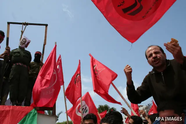 Palestinian workers take part in a protest against the lack of employment opportunities in Gaza City April 30, 2009, a day before World Labour Day APAIMAGES PHOTO / Ashraf Amra