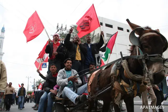 Palestinian workers take part in a protest against the lack of employment opportunities in Gaza City April 30, 2009, a day before World Labour Day APAIMAGES PHOTO / Ashraf Amra