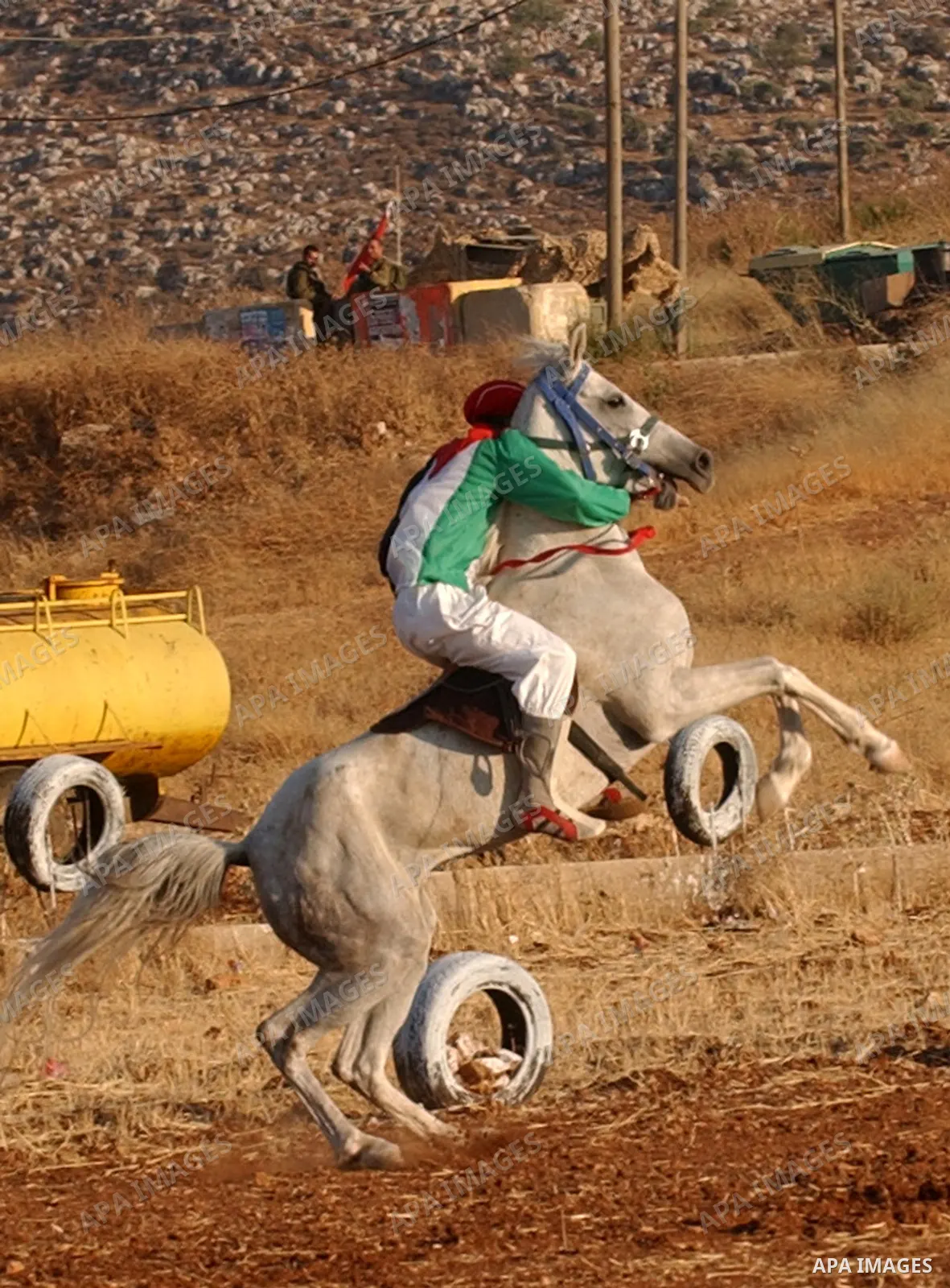 A Palestinians ride Arabian horses during the horse-race in the west bank city of Nablus on July 11, 2009. Photo by Nedal Shtieh