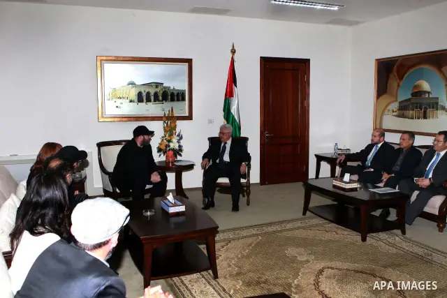 Palestinian President Mahmoud Abbas meets with the President of the Kabbalah center Yehuda Berg in West Bank City of Ramallah, on May 08, 2012. Photo by Mohammad Atiq
