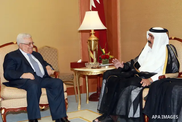 Palestinian President, Mahmoud Abbas (Abu Mazen) meets with Emir of Qatar Sheikh Hamad bin Khalifa Al Thani, in Qatar, on May 19, 2012. Photo by Thaer Ganaim