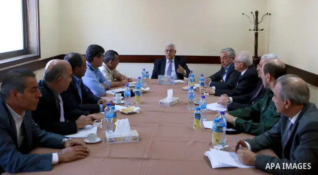 Palestinian President Mahmoud Abbas (Abu Mazen)meets with security chiefs in the West Bank City of Ramallah on June 23, 2012. Photo by Thaer Ganaim