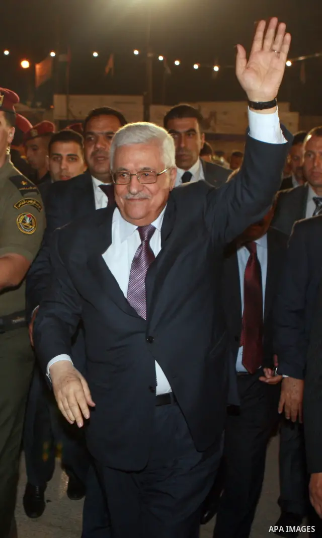 Palestinian President Mahmoud Abbas attends a mass wedding for 19 Groom in the village of Silwad in the West Bank city of Ramallah, June 28, 2012. Photo by Thaer Ganaim