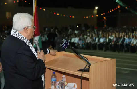 Palestinian President Mahmoud Abbas (Abu Mazen) participates in a graduation ceremony for outstanding students in the West Bank city of Jenin on July 28, 2012. Photo by Thaer Ganaim