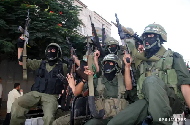 Palestinian Hamas militants take part in a rally held in the refugee camp of Nusseirat in the central Gaza Strip. Palestinian president Mahmud Abbas has rejected a call for talks with arch-rival Hamas ahead of early Nove...