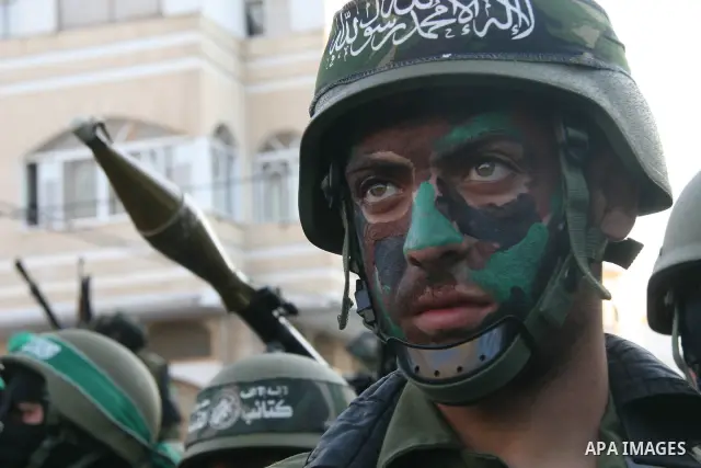 Palestinian Hamas militants take part in a rally held in the refugee camp of Nusseirat in the central Gaza Strip. Palestinian president Mahmud Abbas has rejected a call for talks with arch-rival Hamas ahead of early Nove...