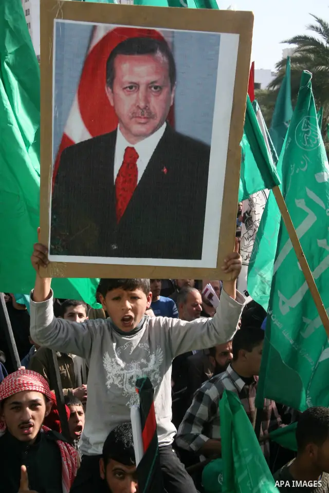 Pictures of Turkish prime minister Recep Tayyip Erdogan are seen during a rally in support of Hamas in Gaza city, Friday, Jan. 30, 2009. Erdogan is winning praise from Gazans after his public spat with Israeli President...