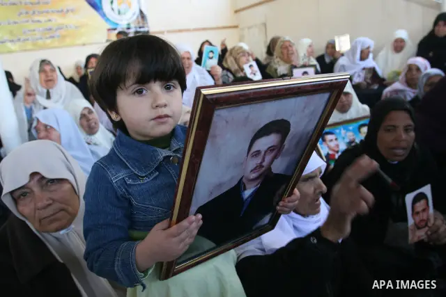 Palestinians take part in a protest in Gaza City calling for the release of Palestinian prisoners held in Israeli jails February 16, 2009. Israel could release Palestinian uprising leader Marwan Barghouthi to bolster Pre...
