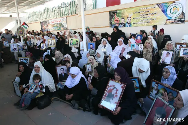 Palestinians take part in a protest in Gaza City calling for the release of Palestinian prisoners held in Israeli jails February 16, 2009. Israel could release Palestinian uprising leader Marwan Barghouthi to bolster Pre...