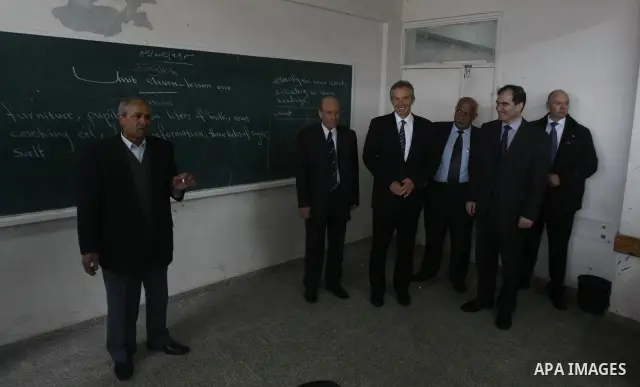 Former British prime minister and Middle East envoy Tony Blair speaks to the press during a visit to a UN-run school in Beit Hanun, northern Gaza Strip, on March 1, 2009. Blair arrived in the Gaza Strip in his first visi...