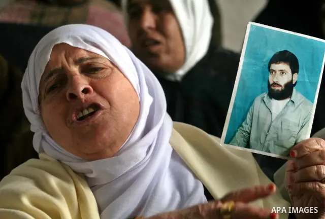 Palestinians take part in a protest in Gaza City calling for the release of Palestinian prisoners held in Israeli jails March 2, 2009 APAIMAGES PHOTO / Ashraf Amra