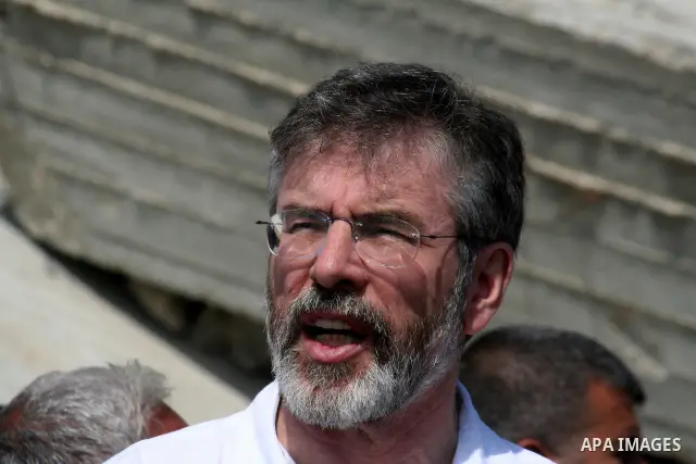 Sinn Fein leader Gerry Adams speaks during a press conference in front of a destroyed building in Jabalia in the northern Gaza Strip on April 8, 2009. Adams urged the Israelis and Palestinians to hold direct talks as he...