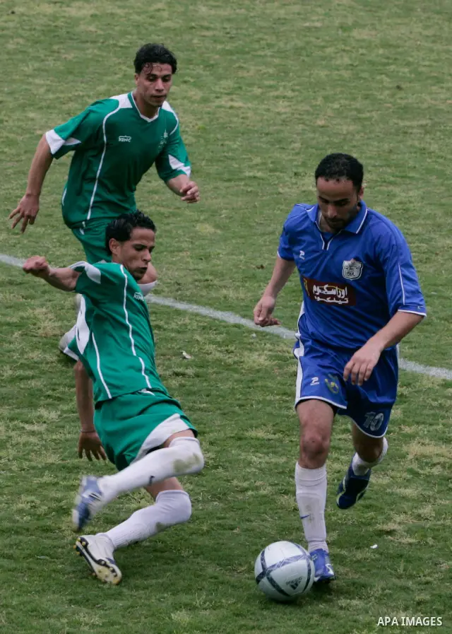 Players from the Shabab Rafah club celebrate after winning against Khadamat Rafah club in their final local championship in Gaza City on April 11, 2009. The championship is the first of its kind since the Islamist moveme...