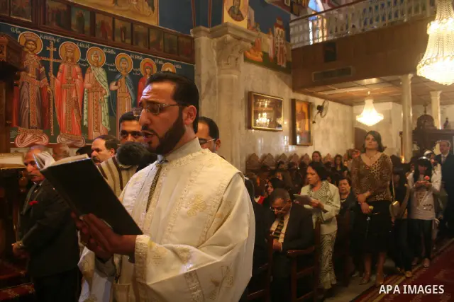 Christian Orthodox priest leads a Palm Sunday mass in a church in Gaza City, Sunday, April. 12, 2009. Followers of the Orthodox and Eastern Churches began marking Holy Week Sunday. APAIMAGES PHOTO / Ashraf Amra