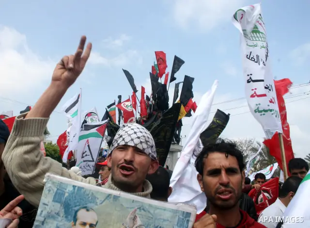 Palestinians shout slogans during a rally calling for the release of Palestinian prisoners from Israeli jails in Gaza City on April 16, 2009 ahead of the Palestinian Prisoner Day. On March 17 Palestinians mark Prisoner D...