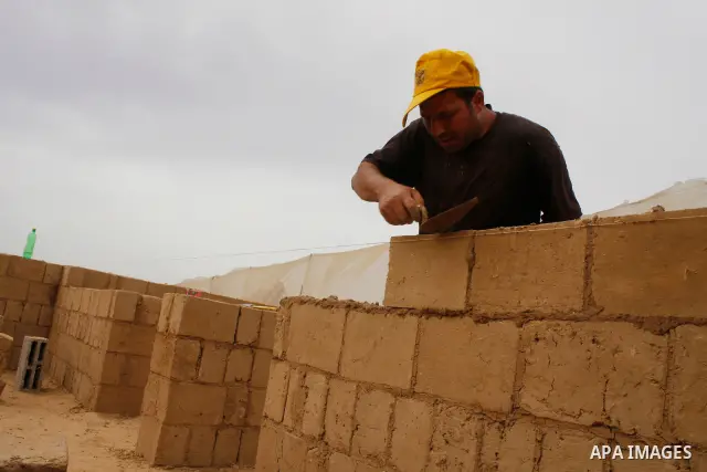 Palestinians build a house with clay, after their home was destroyed in Israel's last military operation in Gaza, in the Rafah refugee camp, southern Gaza Strip. Many parts of the Hamas-run Gaza Strip are still in ruins...