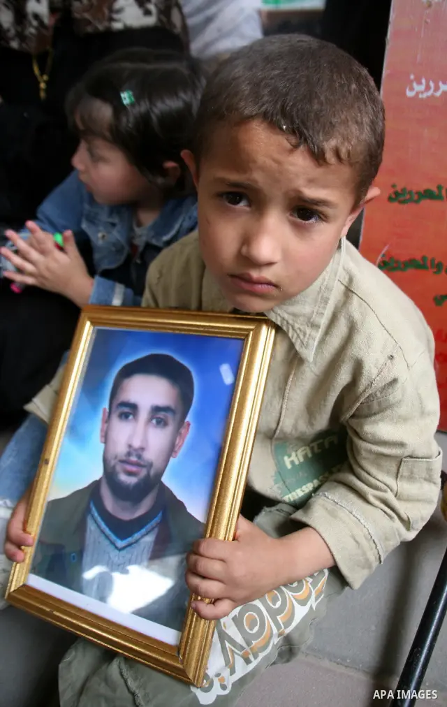 Palestinians take part in a protest in Gaza City calling for the release of Palestinian prisoners from Israeli jails. APAimages Photo / Mohammed Othman