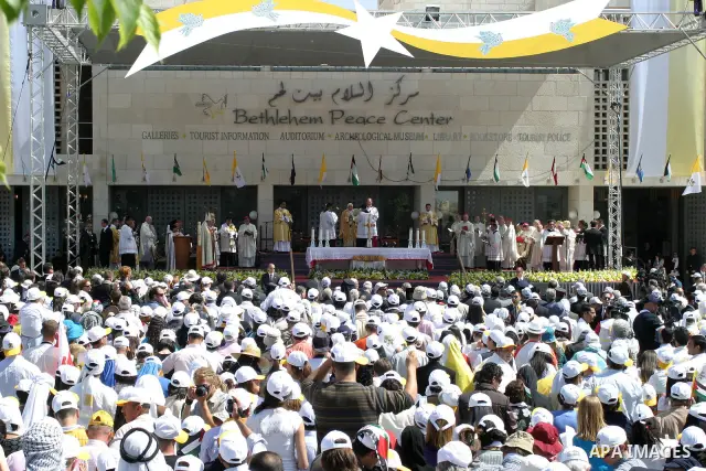 Pope Benedict XVI celebrates a Holy Mass in Manger Square May 13, 2009 in Bethlehem, West Bank. During his visit marred by controversy over his wartime past as a member of the Nazi's Hitler Youth, the Pontiff called for...