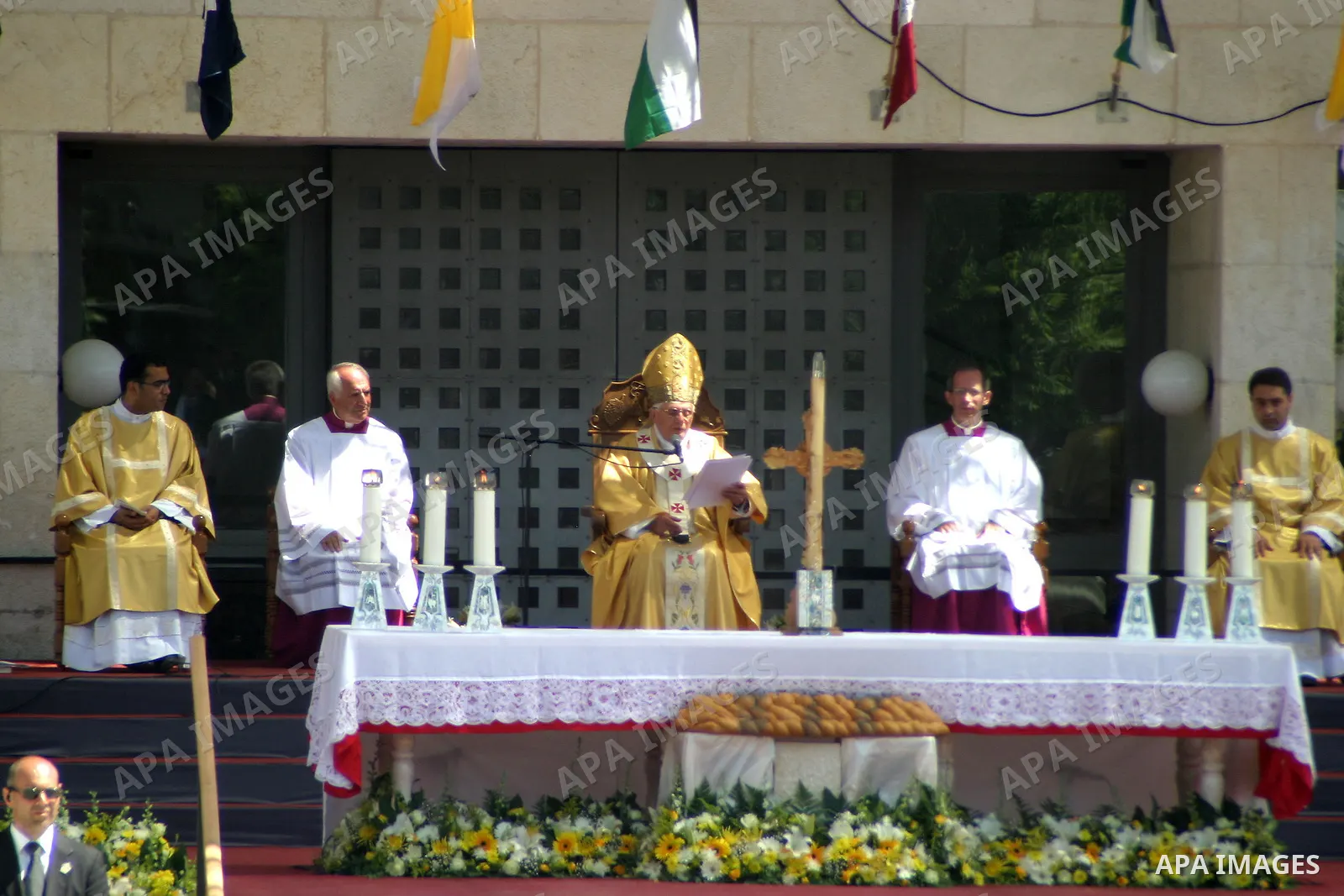 Pope Benedict XVI celebrates a Holy Mass in Manger Square May 13, 2009 in Bethlehem, West Bank. During his visit marred by controversy over his wartime past as a member of the Nazi's Hitler Youth, the Pontiff called for...