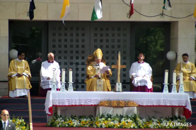 Pope Benedict XVI celebrates a Holy Mass in Manger Square May 13, 2009 in Bethlehem, West Bank. During his visit marred by controversy over his wartime past as a member of the Nazi's Hitler Youth, the Pontiff called for...