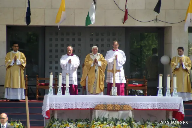 Pope Benedict XVI celebrates a Holy Mass in Manger Square May 13, 2009 in Bethlehem, West Bank. During his visit marred by controversy over his wartime past as a member of the Nazi's Hitler Youth, the Pontiff called for...
