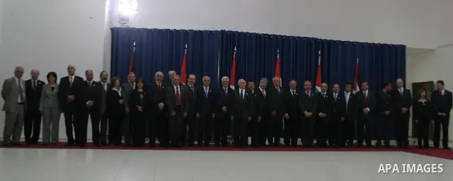Members of the new Palestinian cabinet pose for a group picture after swearing in , in the West Bank city of Ramallah on May 19, 2009. Ten of the 23 ministers in the cabinet, headed by Western-backed Fayyad, are Fatah me...