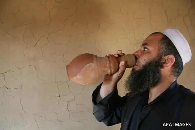 Palestinian Jihad al-Shaer, whose family home was destroyed during the last Israeli war on Gaza, stand in his new mud house in the southern Gaza Strip refugee camp of Rafah on May 24, 2009. the new mud house of jihad al-...