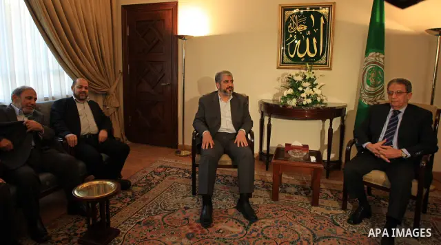 Arab League Secretary General Amr Mussa meets with Hamas leaders Khaled Meshaal, Mussa Abu Marzuq and Mahmoud Zahar at the institution's headquarters in Cairo on June 9, 2009. Meshaal is on an official visit for talks on...