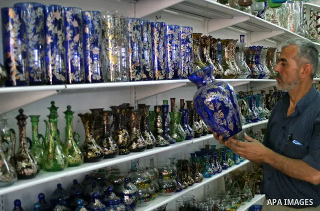 Palestinian workers make a different types of glasses in AL-SALAM factory in the West Bank city of Hebron June 11, 2009. Glass has been a traditional industry in Hebron for over 600 years but as a result of the increased...