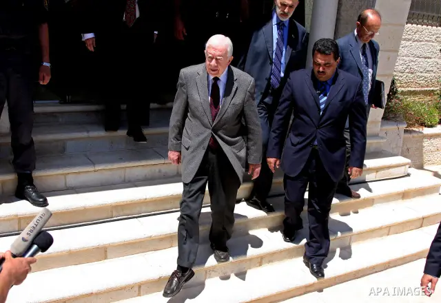 Former US president Jimmy Carter talks to the media following a meeting with Palestinian Prime Minister Salam Fayyad in the West Bank city of Ramallah on June 13, 2009. PHOTO/Issam rimawi