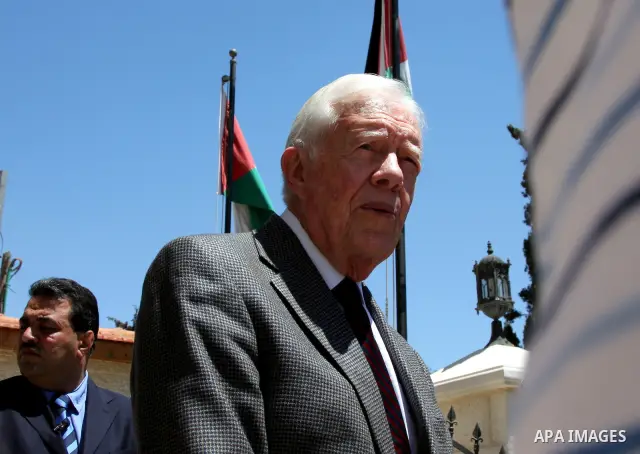 Former US president Jimmy Carter talks to the media following a meeting with Palestinian Prime Minister Salam Fayyad in the West Bank city of Ramallah on June 13, 2009. PHOTO/Issam rimawi