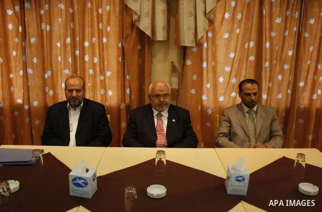 Palestinian Hamas officials (from L) Ismail al-Ashkar, Ayman Taha and Jamal Abu Hashem arrive to meet Fatah officials in Gaza City on June 14, 2009. The two main Palestinian factions Fatah and Hamas convened meetings in...