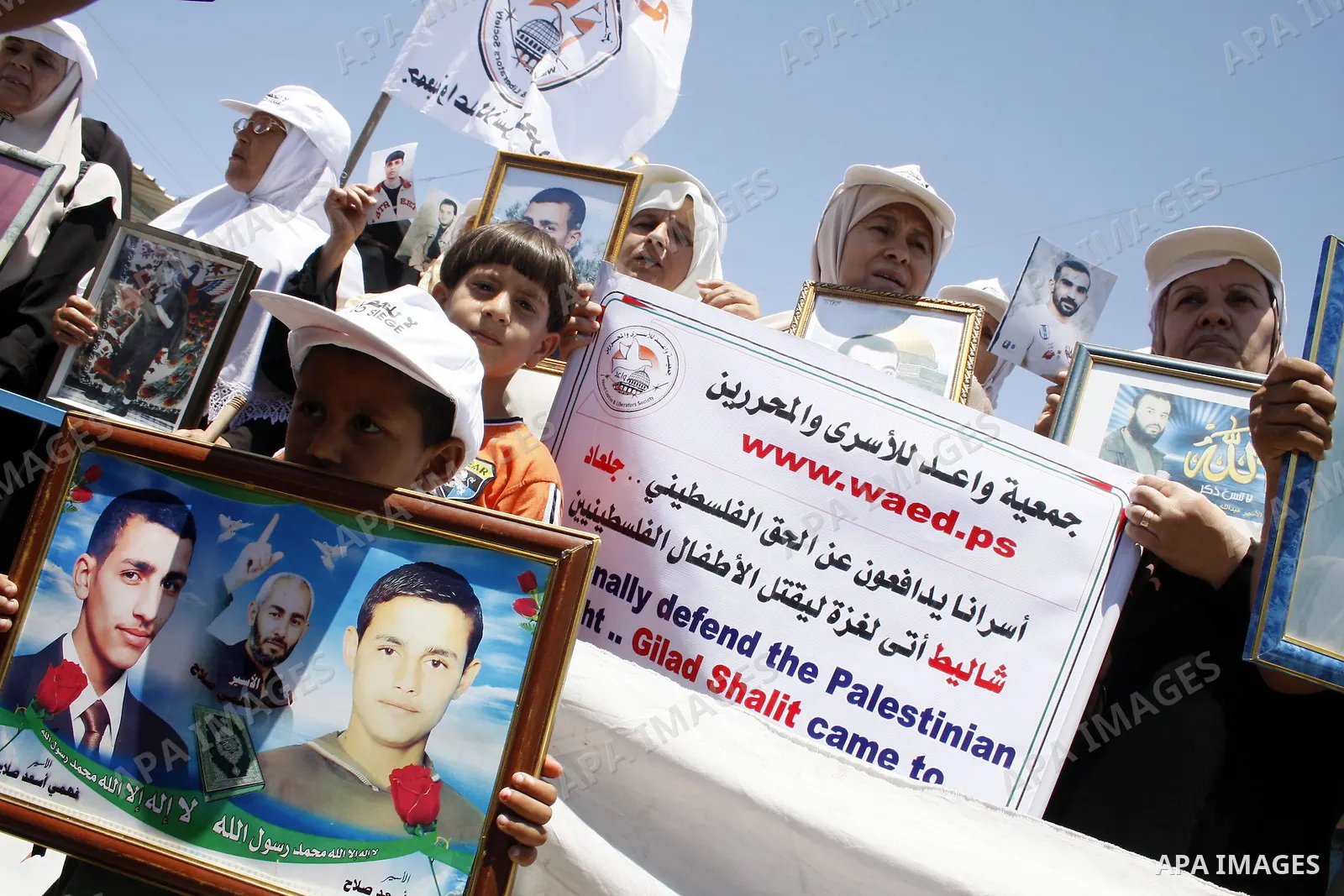 Palestinians takes part in a protest calling for the release of Palestinian prisoners held in Israeli jails, near Erez crossing in the northern Gaza Strip June 23, 2009 PHOTO By/ Ashraf Amra