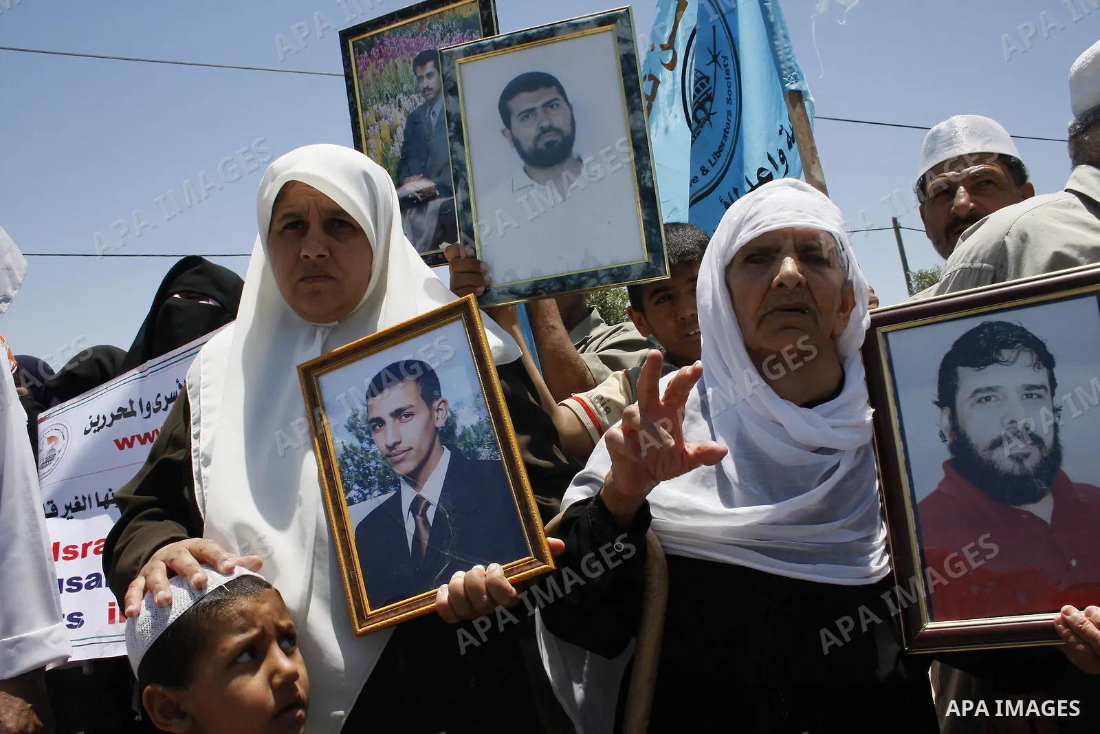 Palestinians takes part in a protest calling for the release of Palestinian prisoners held in Israeli jails, near Erez crossing in the northern Gaza Strip June 23, 2009 PHOTO By/ Ashraf Amra