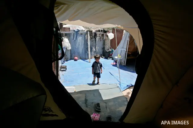 A Palestinians live in a tents after their homes were destroyed during the last Israeli war on Gaza, northern Gaza City on June 27, 2009. Photo by Naaman Omar