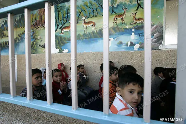 A Palestinian orphans play in the playground of the SOS Children's Village in Rafah the southern Gaza Strip on June 30, 2009. The school for orphans that was established in 2000 with the sponsorship of the Austrian SOS i...