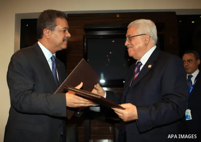 Palestinian President Mahmoud Abbas meets with Dominican Republic President Leonel Fernandez Reyna on the fringe of Non-Aligned Movement summit in the Red Sea resort of Sharm El-Sheikh in Egypt on July 15, 2009. Photo by...