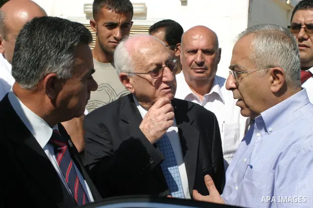 Palestinian prime minister Salam Fayyad (R),the mayor of Bethlehem (C) and governor of Hebron dr. hossin al- a`araj (L) during the opening the water project and the hole Rashaida Arabs and the line carrier and the electr...