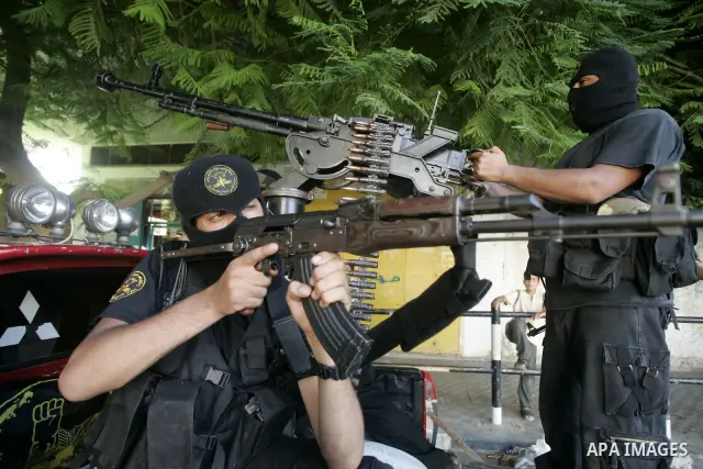 Palestinian fighters of the Islamic Jihad movement during a rally in the Khan Yunis refugee camp in the southern Gaza Strip on July 24, 2009. Photo By Abed Rahim Khatib