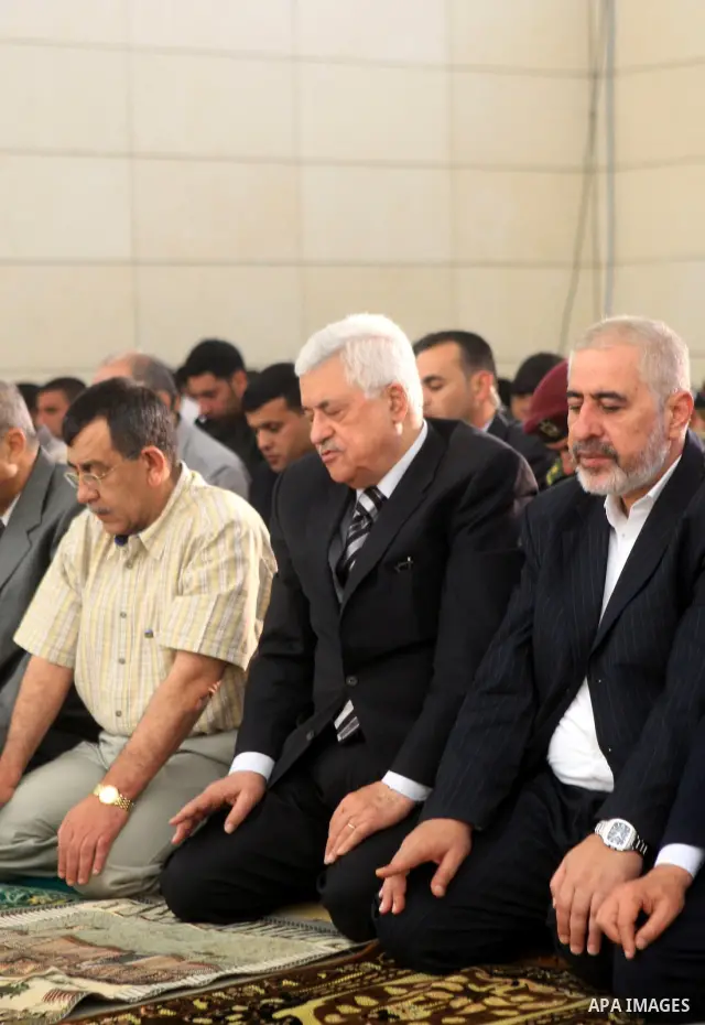 Palestinian President Mahmoud Abbas attends the Friday prayers in the West Bank of Ramallah on July 24, 2009. Photo by Thaer Ganaim