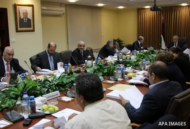 Palestinian Prime minister Salam Fayyad heads the cabinet meeting in the West Bank city of Ramallah on July 27, 2009. Photo by Issam Rimawi