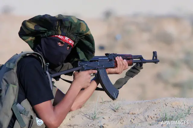 Palestinian fighter from the Democratic Front for the Liberation of Palestine (DFLP), take part in a military training in Rafah southern Gaza Strip, August 10, 2009. Taking advantage of relevant calmness, the Palestinian...
