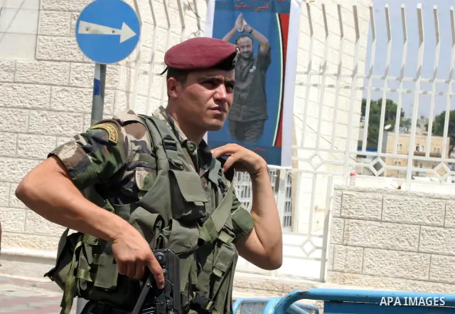 Members of the Palestinian security forces stand guard near of the Church of the Nativity, during the Fatah conference in the West Bank town of Bethlehem on August 11, 2009. Photo by Najeh Hashlamoun