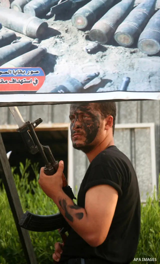 Hamas security forces during a military parade at a governmental compound that was destroyed during Israel's December-January offensive on the Gaza Strip, in Gaza City on August 13, 2009 to honour comrades who were kille...