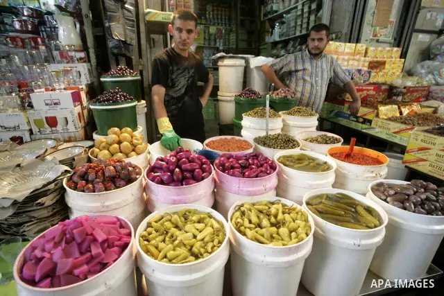 A Palestinians shop at a popular market during preparing for Islam's holy month of Ramadan in Gaza City on August 19, 2009. Ramadan is a Muslim religious observance that takes place during the ninth month of the Islamic...