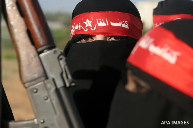 A Women militants from the Democratic Front for the Liberation of Palestine (DFLP) attend a military training session in Khan Younis, southern Gaza Strip, Monday, Aug. 20, 2009. Founded in 1969 the DFLP is a Palestinian...