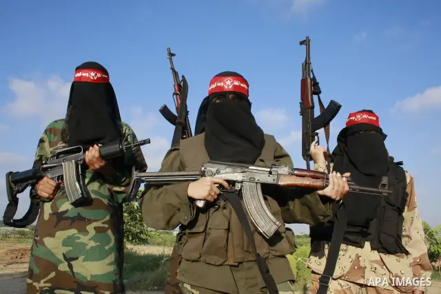 A Women militants from the Democratic Front for the Liberation of Palestine (DFLP) attend a military training session in Khan Younis, southern Gaza Strip, Monday, Aug. 20, 2009. Founded in 1969 the DFLP is a Palestinian...